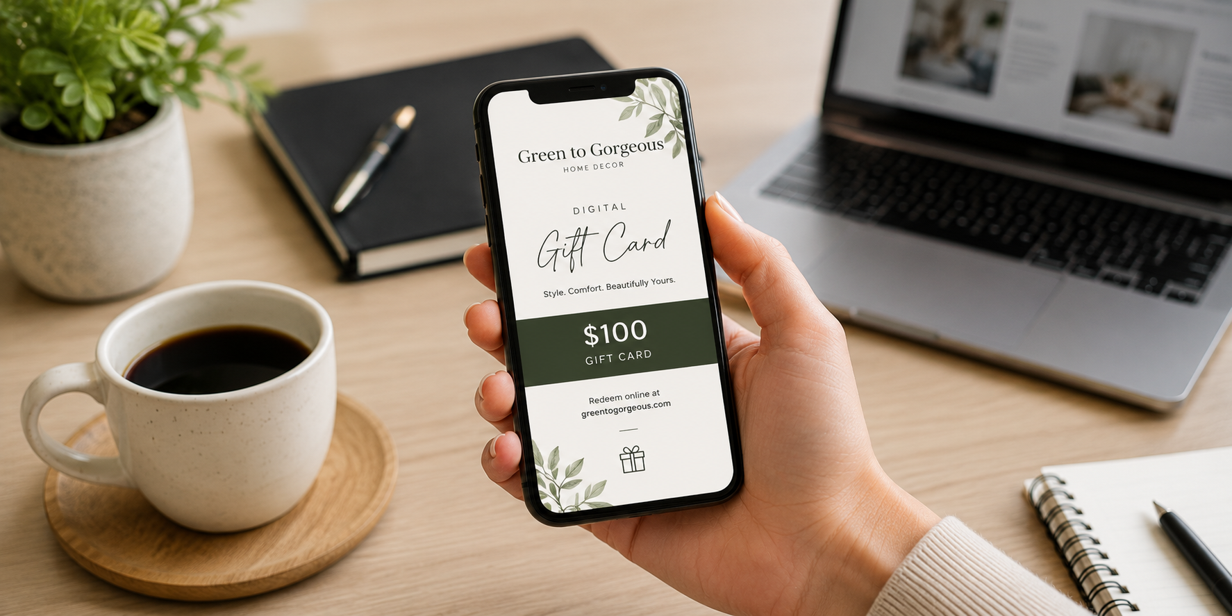A digital gift card displayed on a smartphone screen with subtle office background elements and a coffee cup